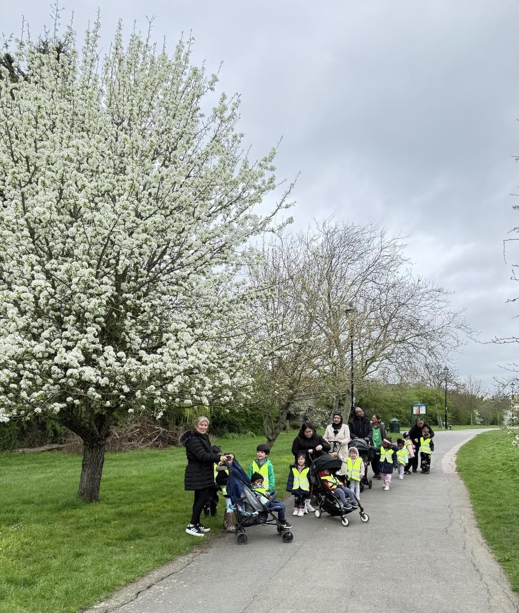 destiny haven nursery group on a treelined path