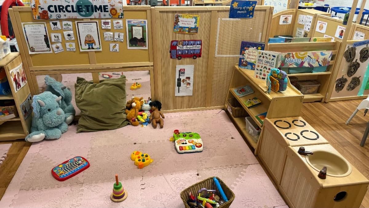 destiny haven nursery infant play area with toys and books