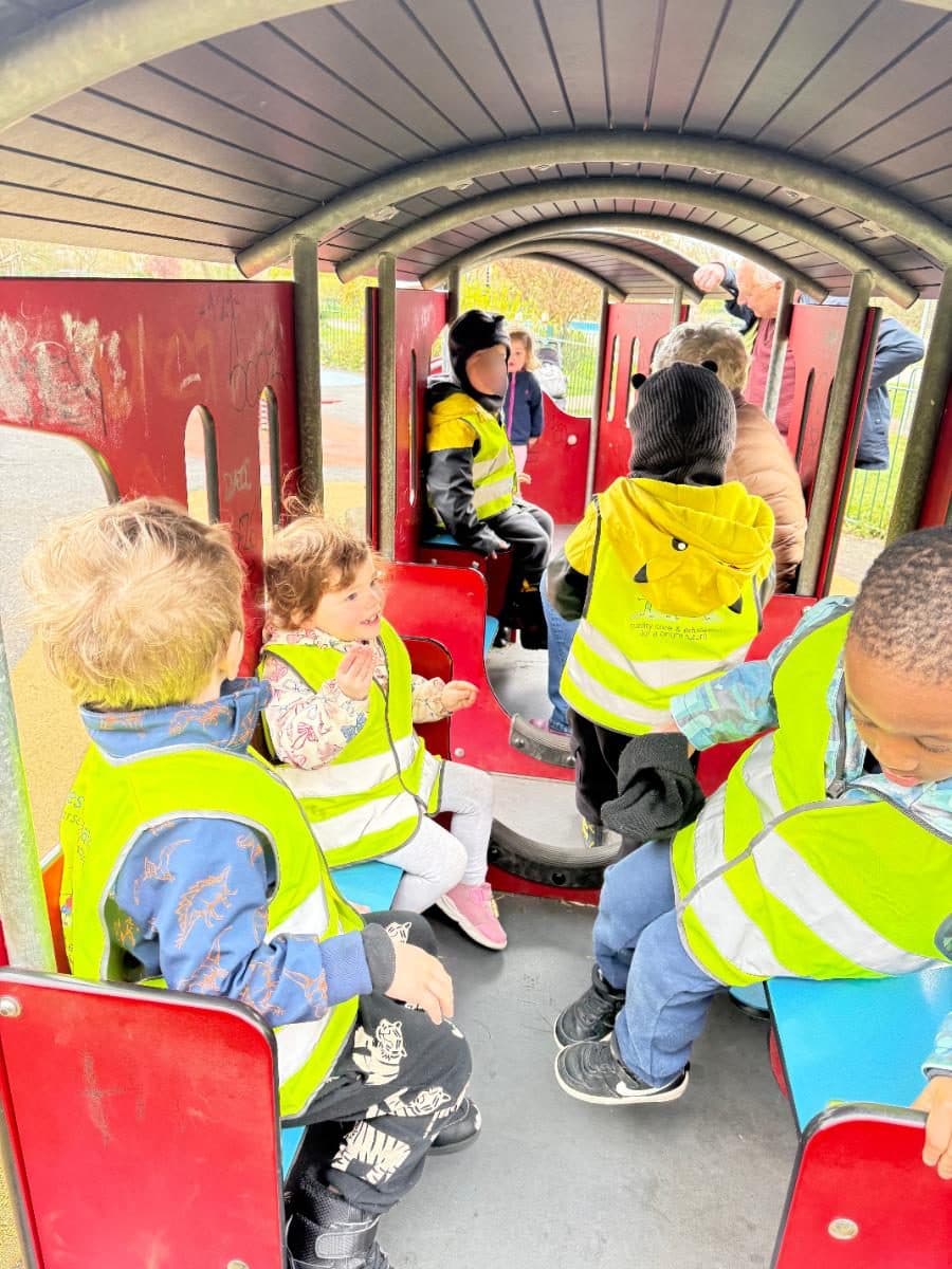 destiny haven nursery nursery children ride together in a red train car